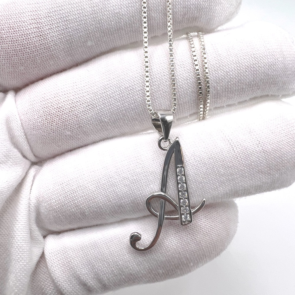 One .925 Sterling Silver Initial Necklace